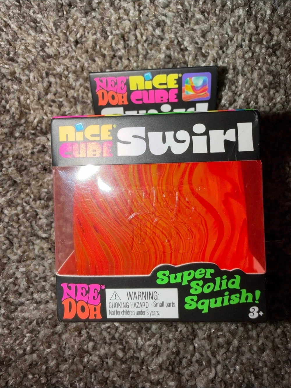 Schylling NeeDoh Nice Cube SWIRL - Super Solid Squish! - orange red color